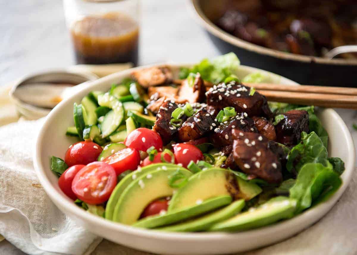 Asian Salmon Salad - Salmon dripping in a gorgeous Asian glaze on a fresh, vibrant salad drizzled with sesame dressing. Quick to make, packed with serious flavour! www.recipetineats.com