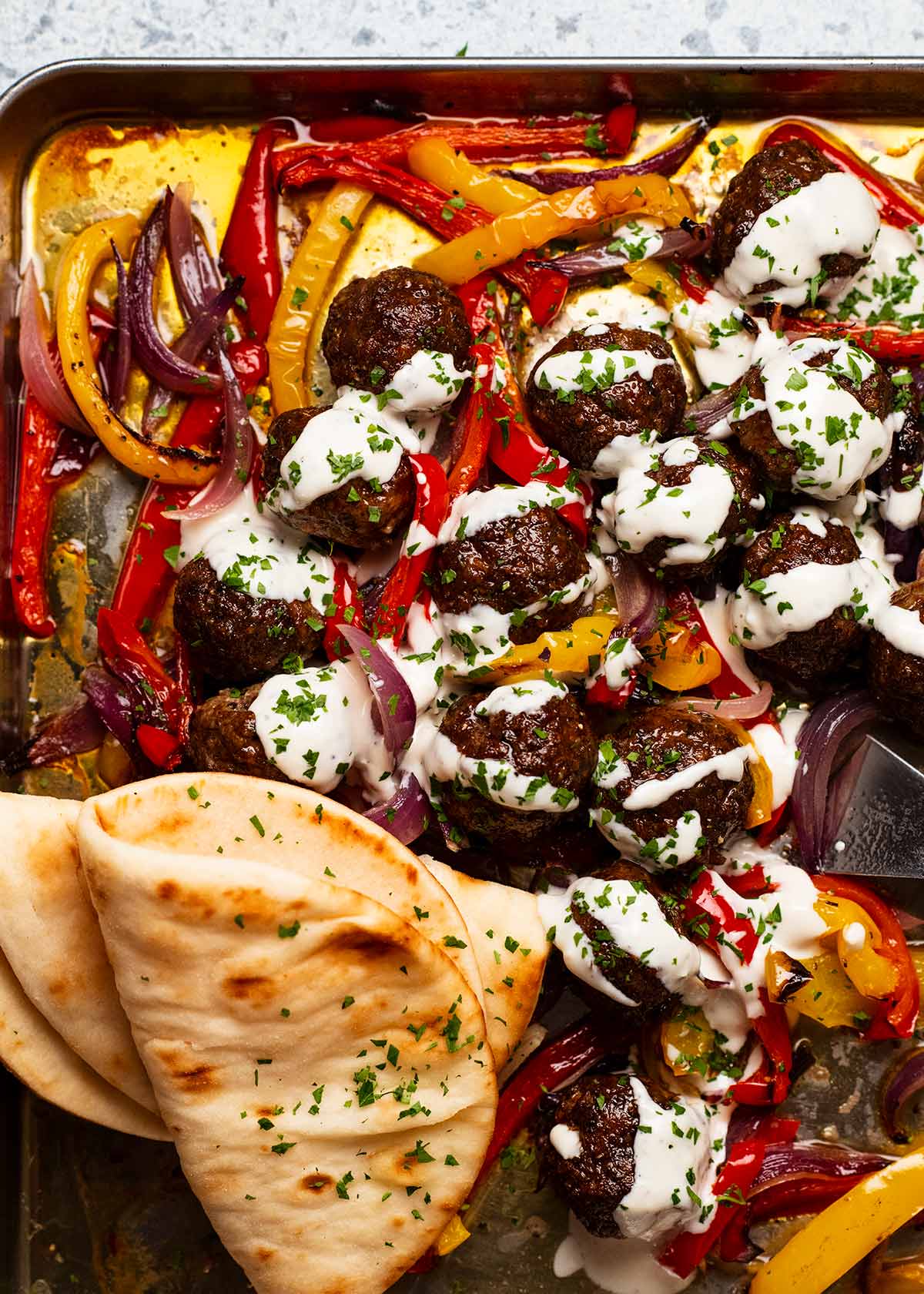 Freshly made Baked lamb kofta meatballs and vegetables