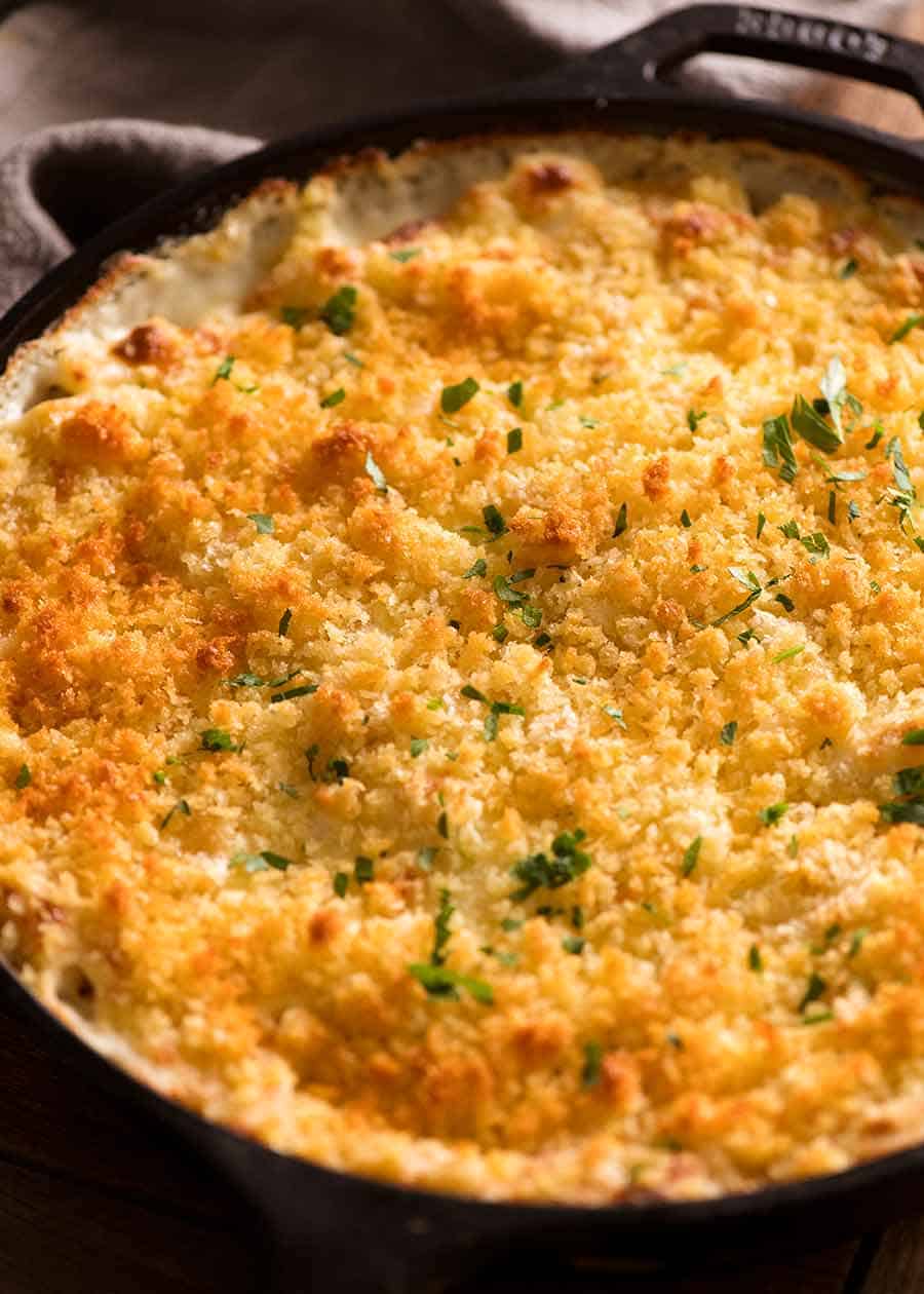 Baked Macaroni Cheese in a black skillet fresh out of the oven