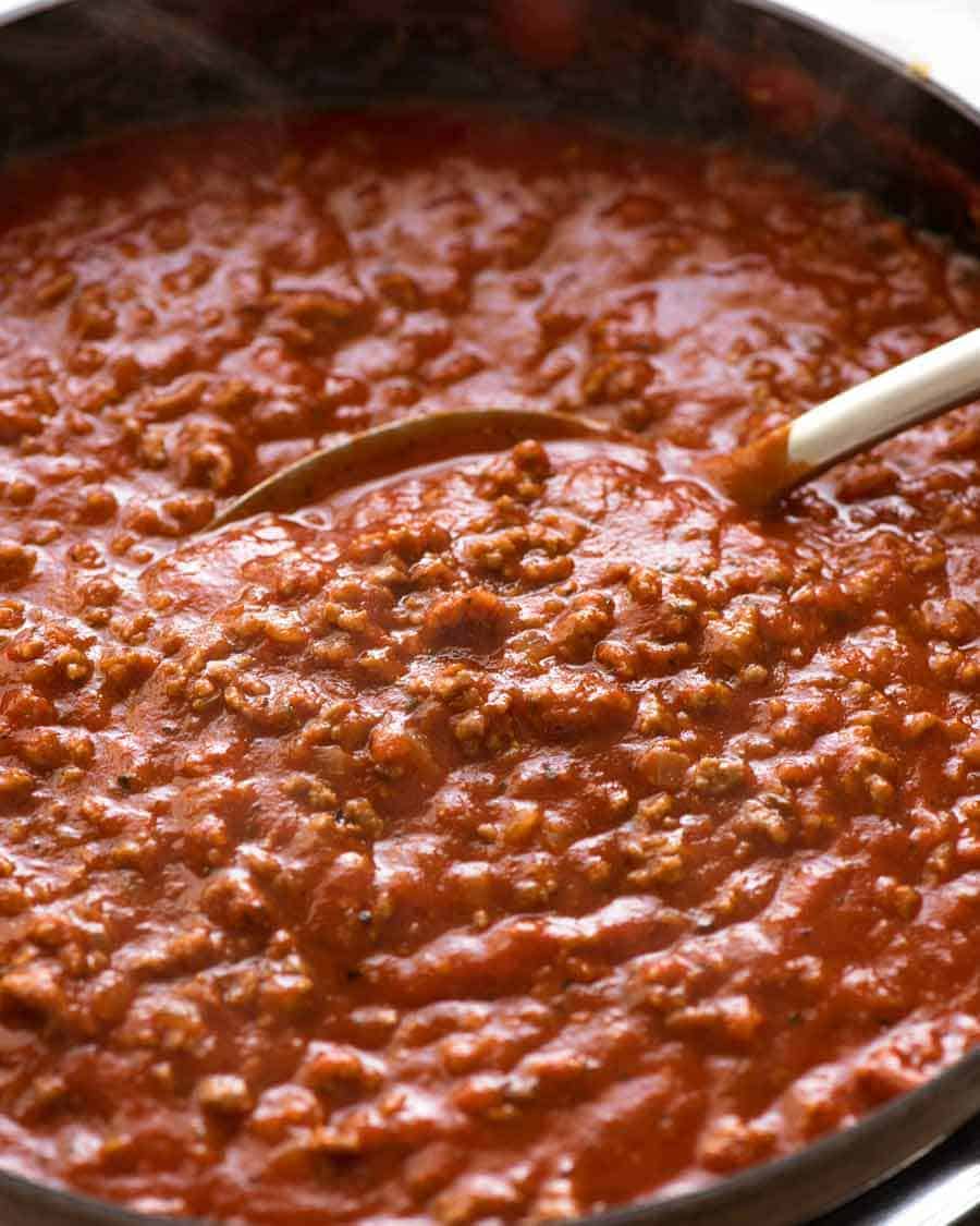 Baked Ziti Sauce in a black skillet, ready to pour over ziti pasta