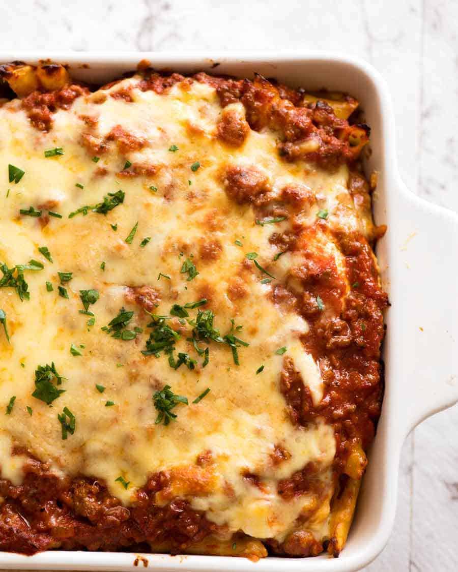 Overhead of Baked Ziti in a baking dish, fresh out of the oven