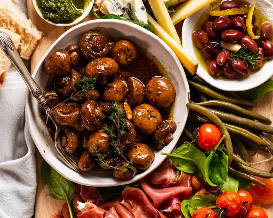 Balsamic marinated mushrooms on a grazing board