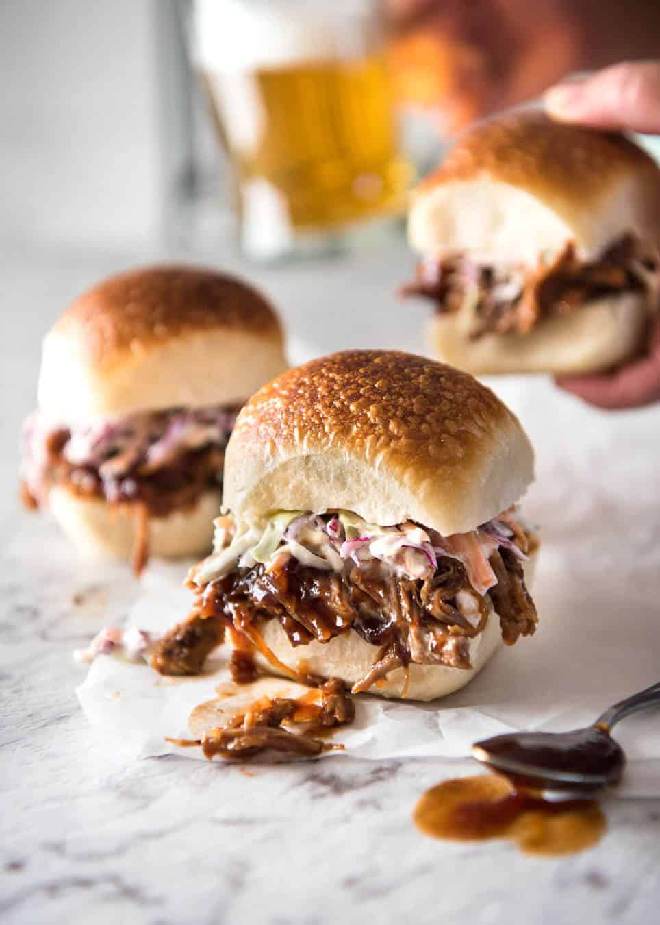 Slow Cooker BBQ Pulled Pork Sandwich - Perfectly seasoned, tender pulled pork tossed in a homemade BBQ sauce, piled onto bread with coleslaw. Slow cooker, pressure cooker or oven. www.recipetineats.com