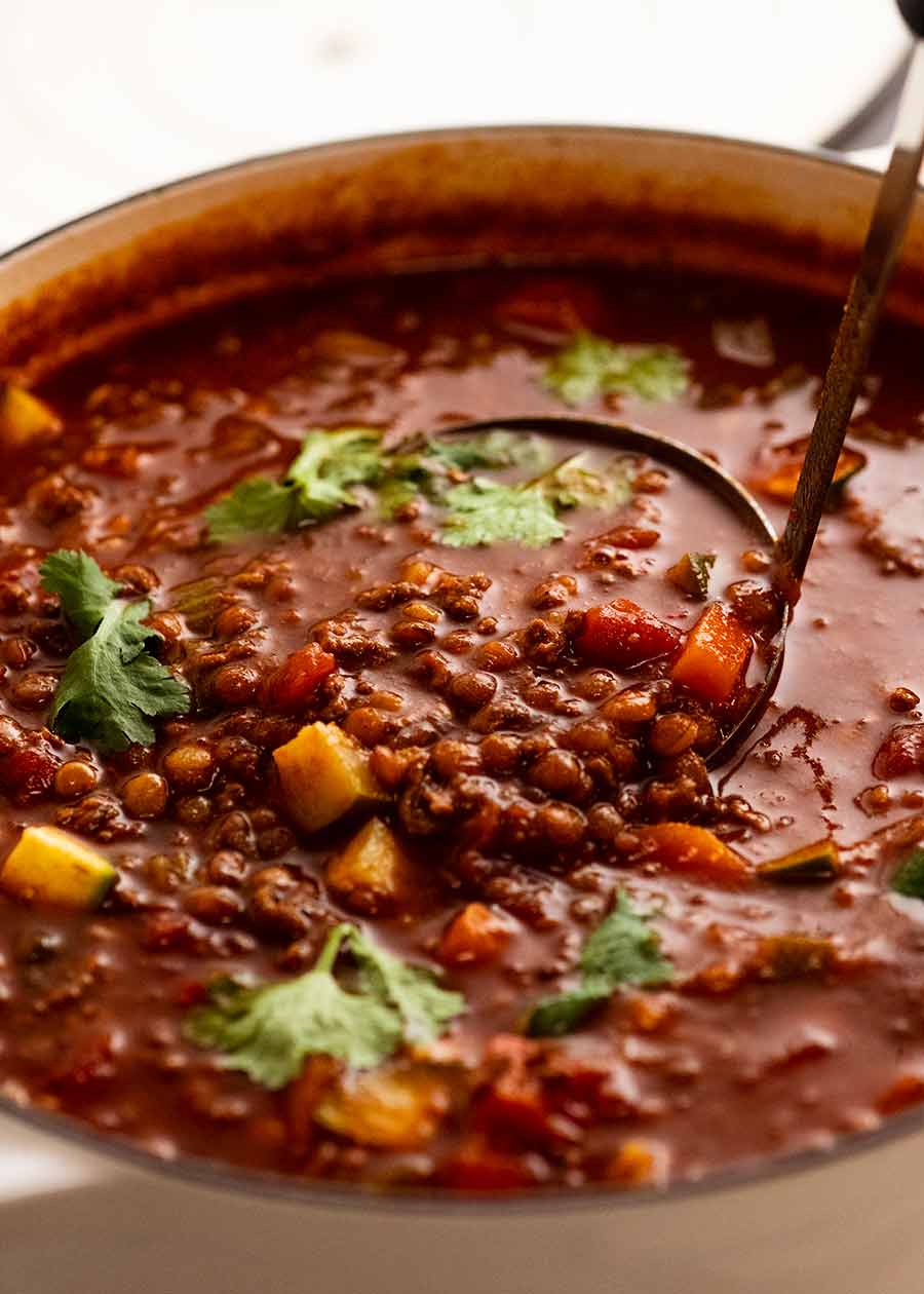 Close up of pot of Beef and Lentil Soup made with ground beef / beef mince, fresh off the stove