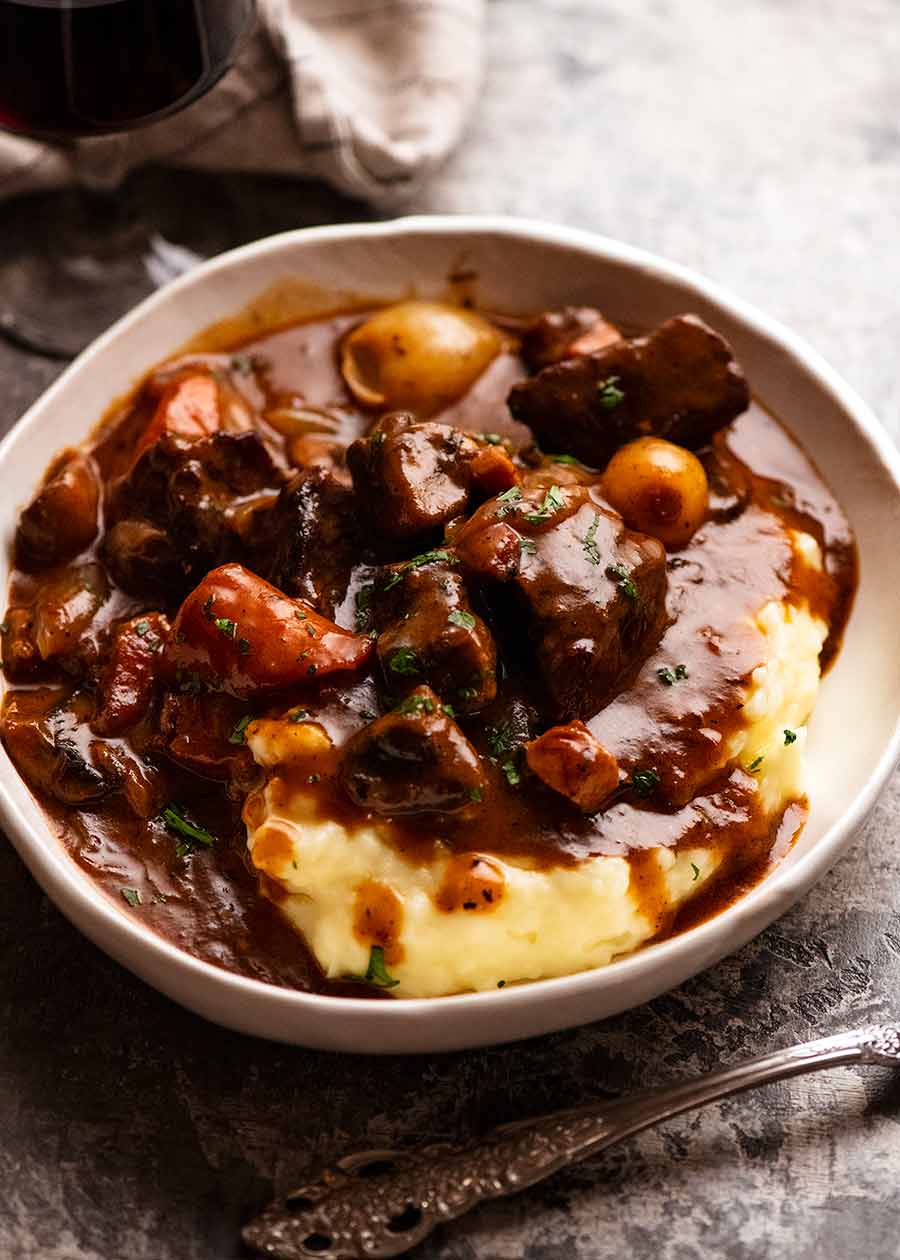 Beef Bourguignon served over creamy mashed potato