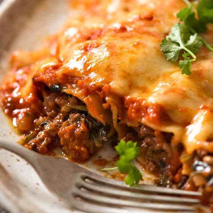 Close up of Spinach Beef Cannelloni on a plate, ready to be eaten