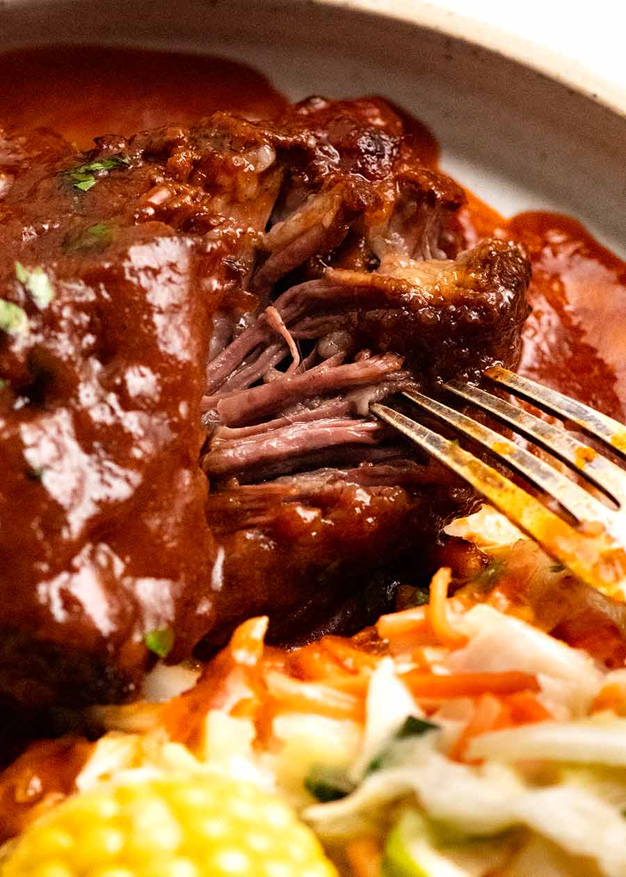 Showing how tender the beef short ribs meat is