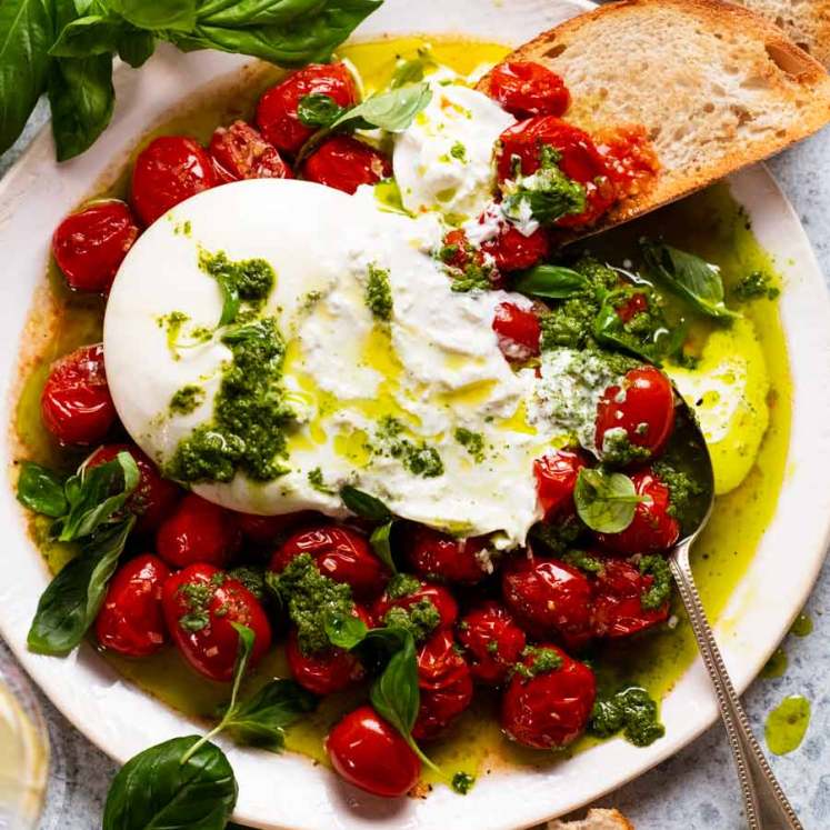 Overhead photo of Burst tomato burrata salad