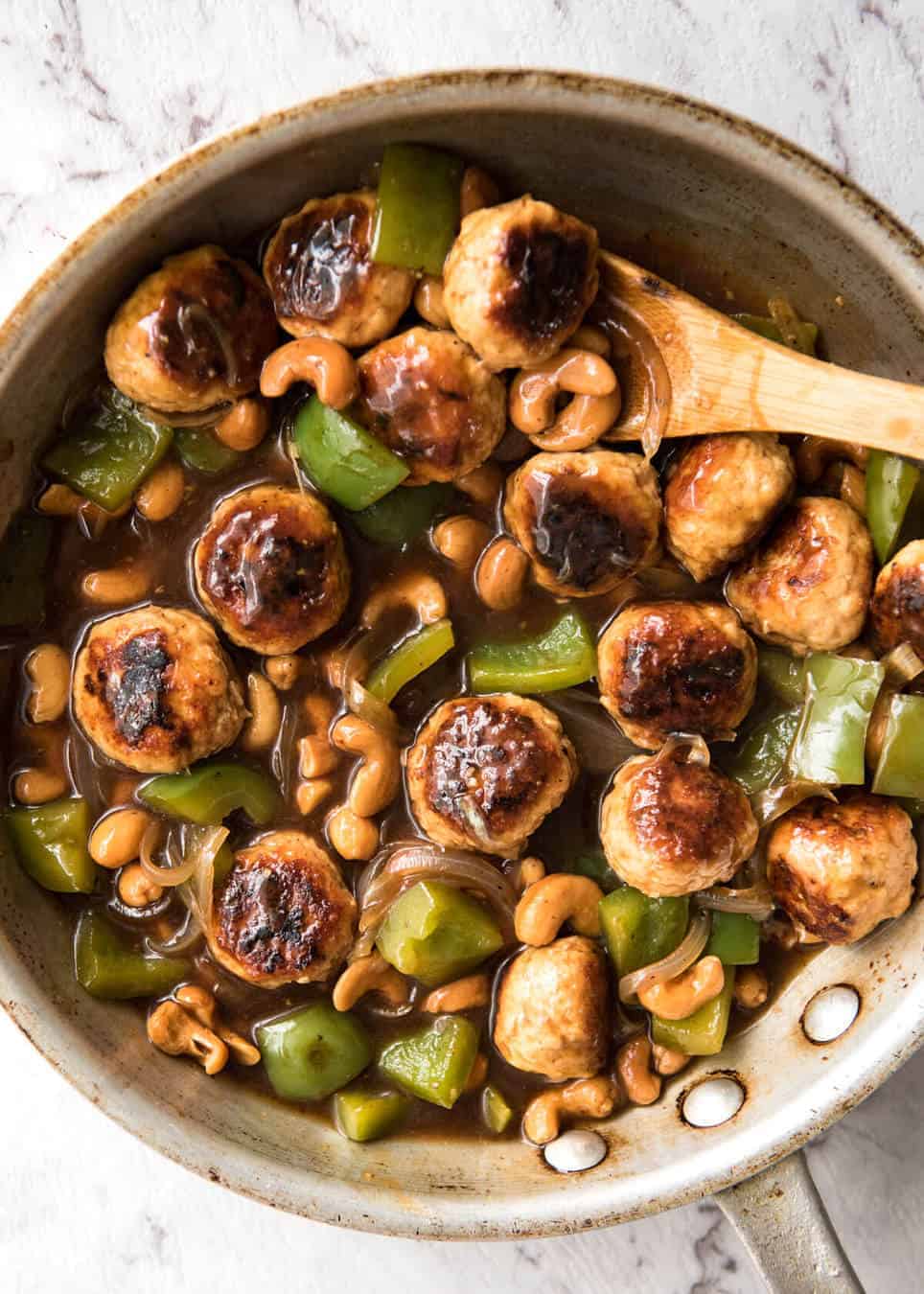 This Chinese Cashew Chicken Meatballs recipe is everything you know and love about Cashew Chicken...made with meatballs! recipetineats.com