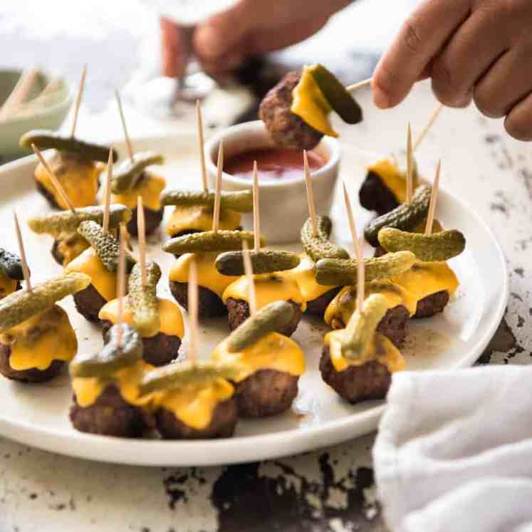 Cheeseburger Party Meatballs - tastes like a cheeseburger, in bite size form! Great for making ahead - fully assemble (inc toothpicks), 90 sec reheat in microwave. recipetineats.com