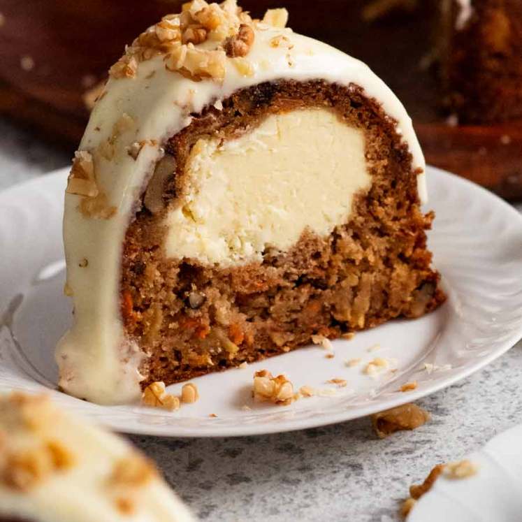 Slice of Cheesecake stuffed carrot bundt cake