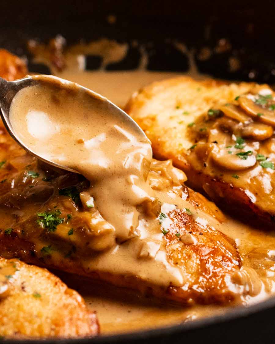 Spoon Marsala sauce over chicken