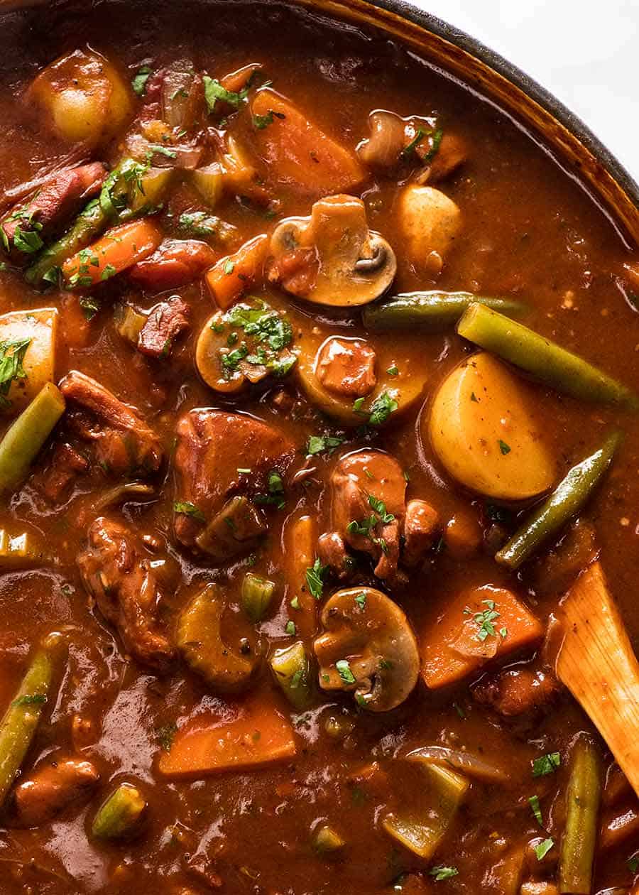 Overhead close up of Chicken Stew in a casserole pot, fresh off the stove