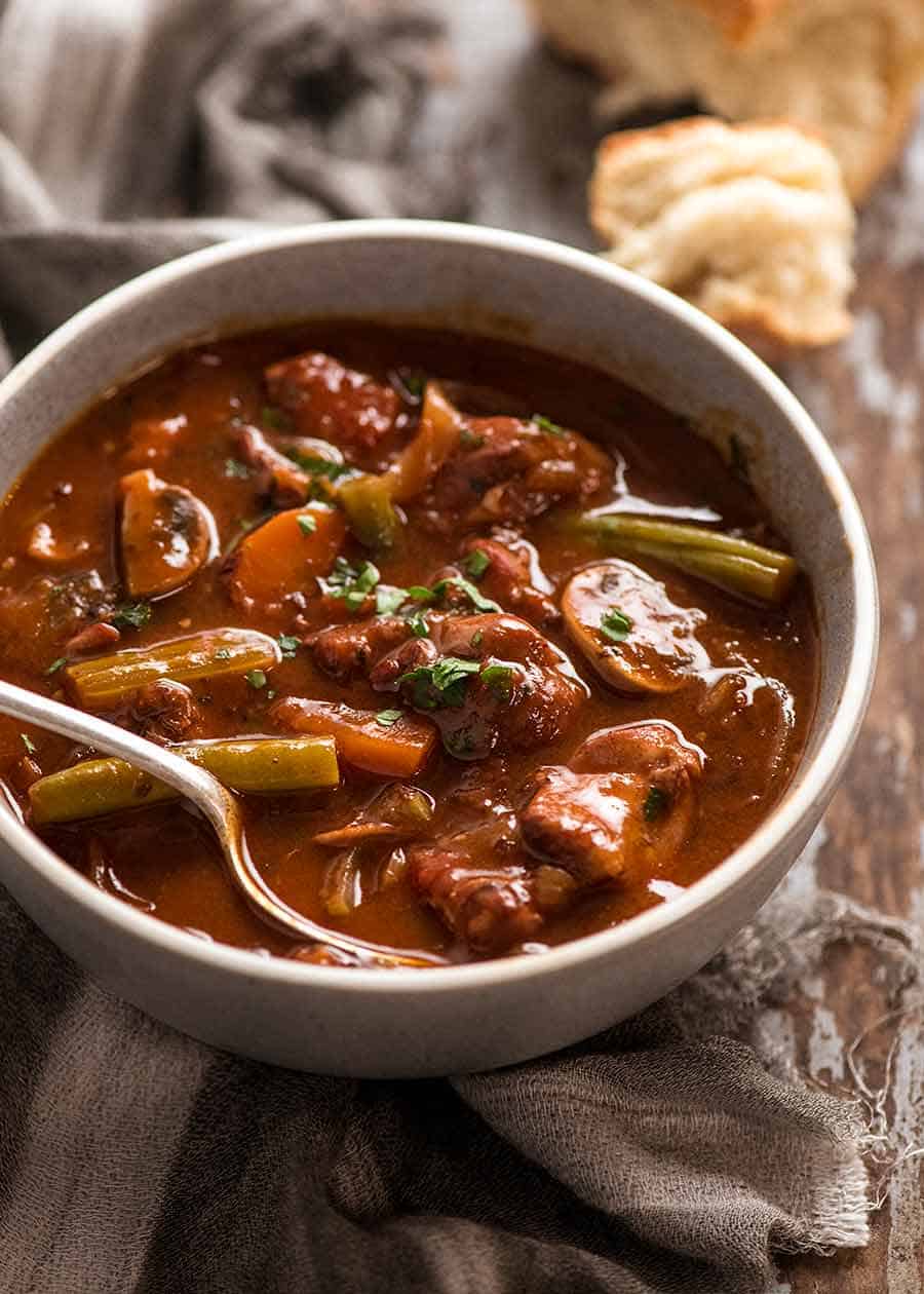 Chicken Stew in a rustic blue bowl, ready to be eaten