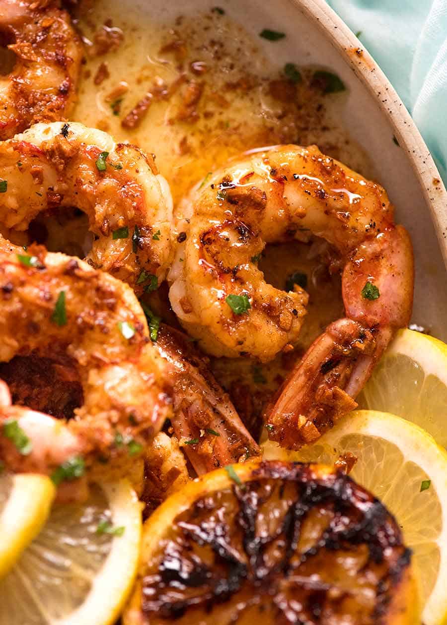 Close up of freshly cooked Crispy Grilled Shrimp with Lemon Garlic Butter Sauce on a plate, ready to be served