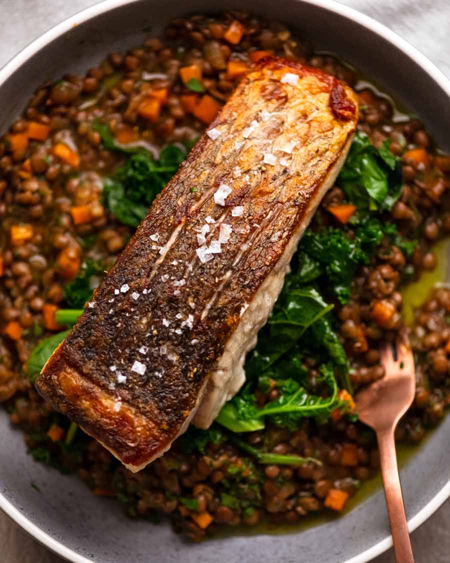 Crispy Skin Barramundi served with a side of French Lentil Ragu