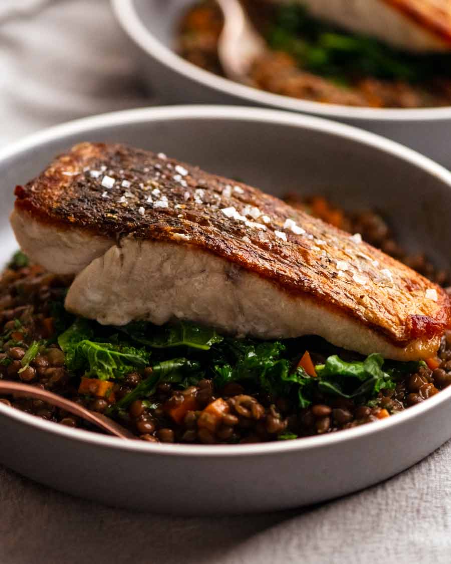 Crispy Skin Barramundi served with a side of French Lentil Ragu