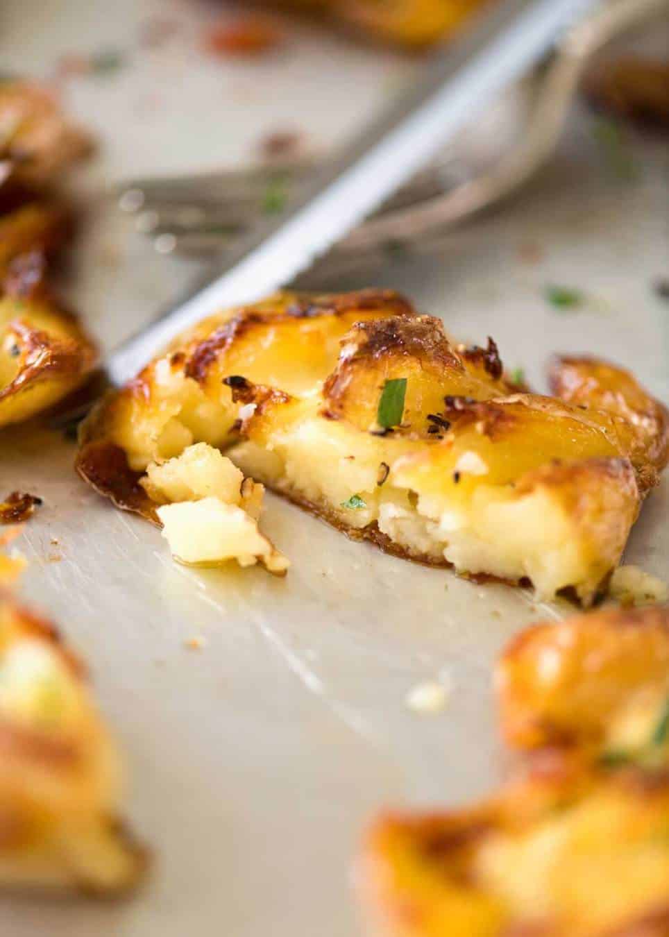 The best, buttery, golden, ultra crispy smashed potatoes you will ever have! www.recipetineats.com