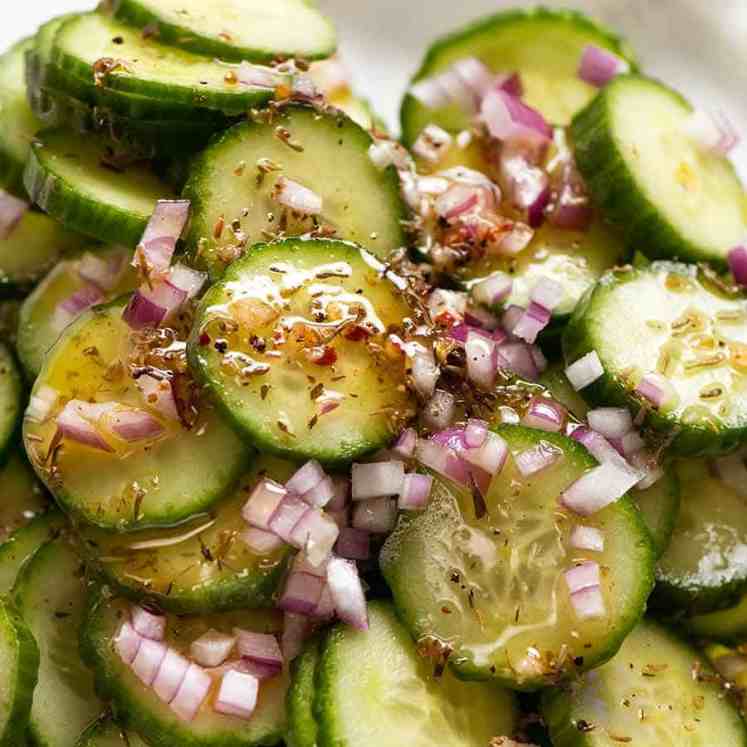 Close up of a refreshing Cucumber Salad with a tasty Herb & Garlic Dressing