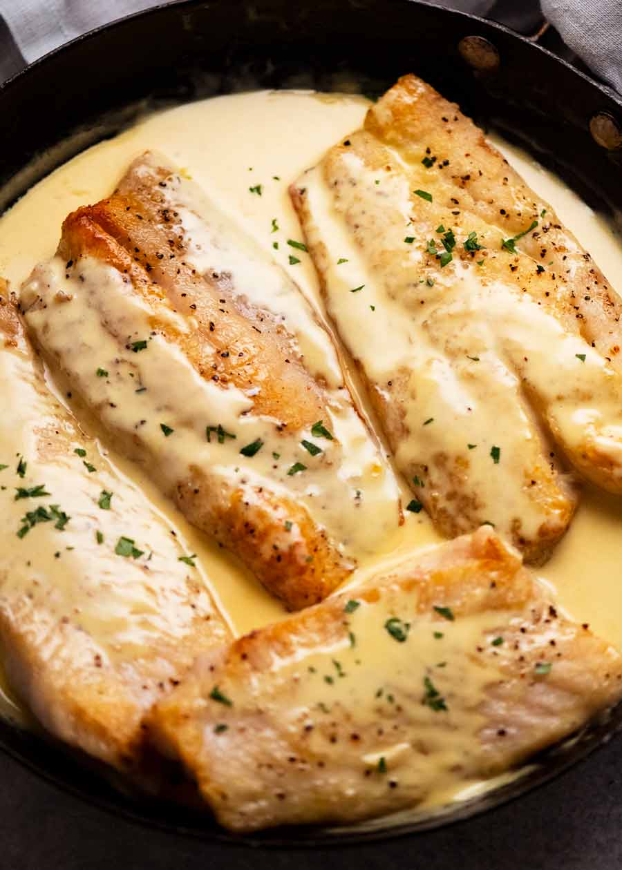 Freshly cooked fish with white wine sauce