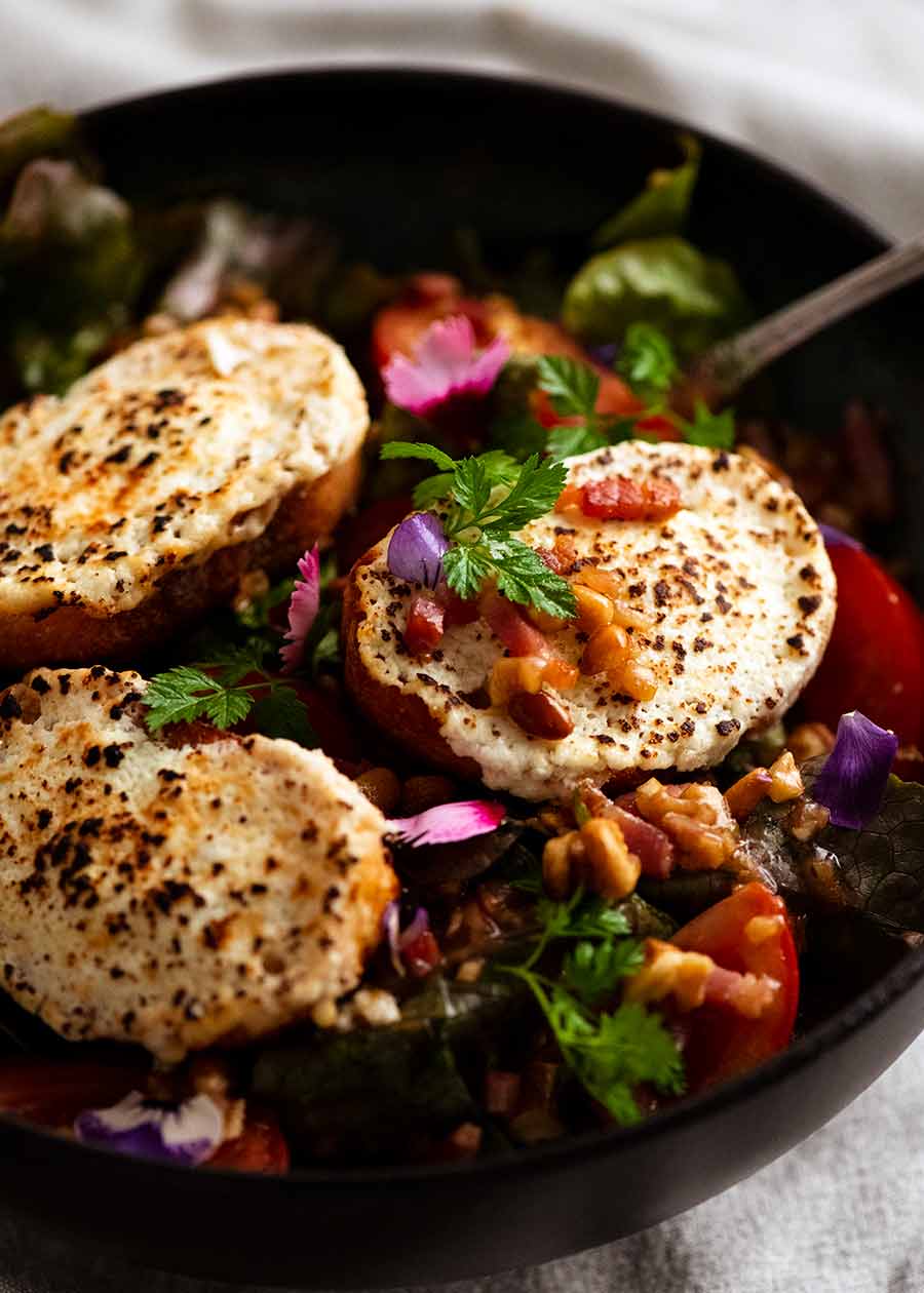 Warm French Goat's Cheese Salad (Salade de Chêvre Chaud) in a bowl, ready to be eaten