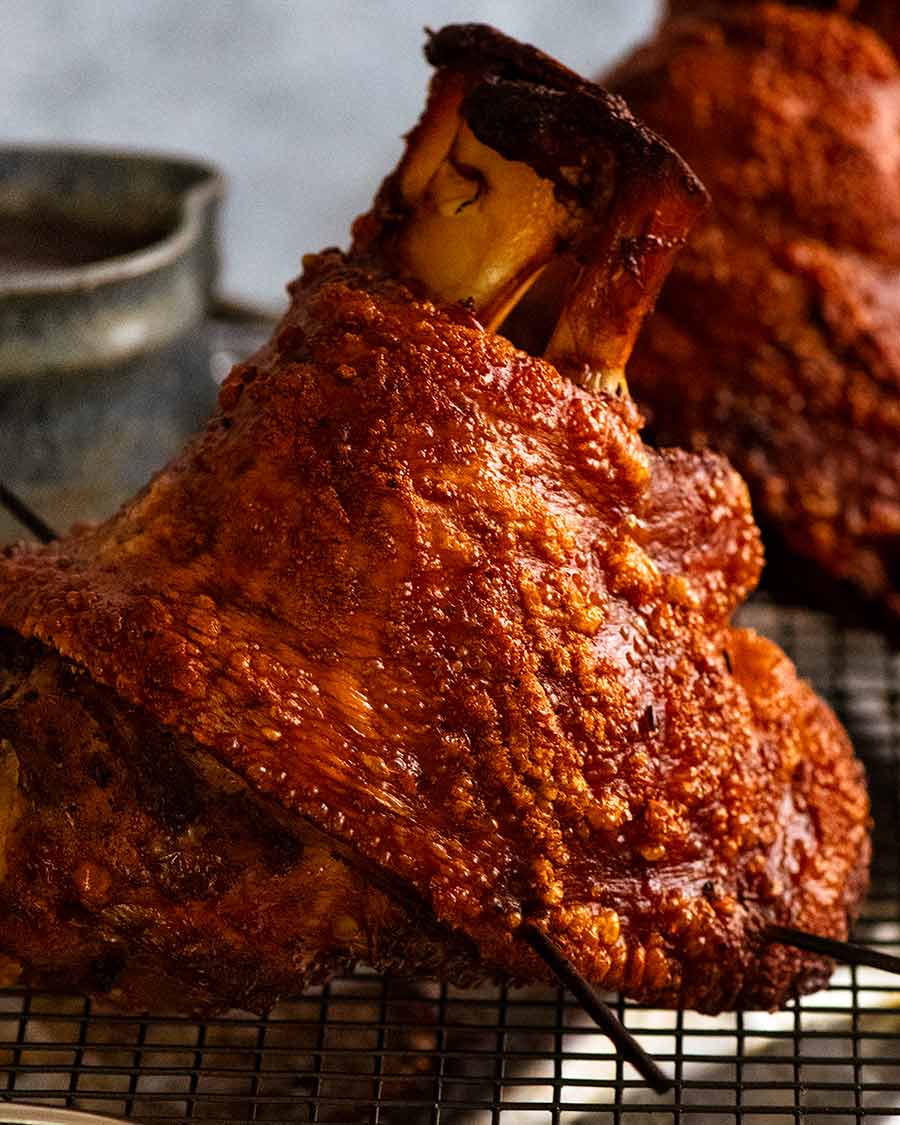 Close up photo of roasted German Pork Knuckle (Schweinshaxe) with really crispy skin!