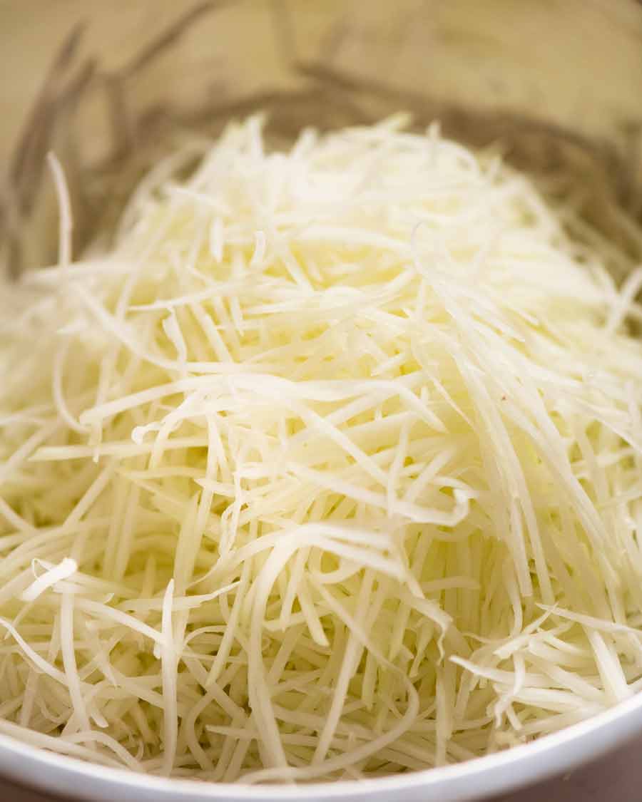 Bowl of shredded green papaya