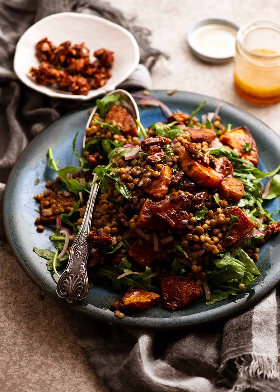 Platter piled high with Honey Cinnamon Pumpkin Lentil Salad