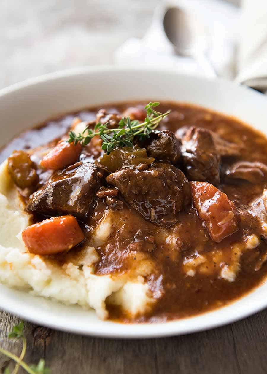 Photo of Irish Beef Guinness Stew over mashed potato, ready to be eaten