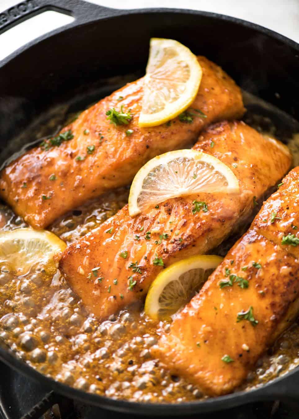 If this Lemon Honey Glazed Salmon takes more than 8 minutes to make, you've overcooked the salmon. That sauce is lip smackingly delicious! www.recipetineats.com