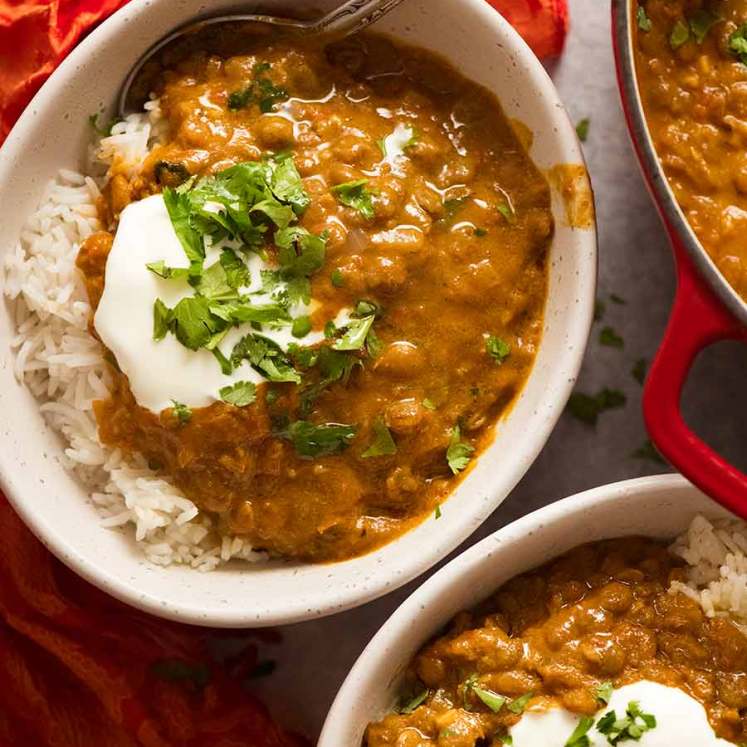 Overhead photo of Lentil Curry served over rice, ready to be eaten