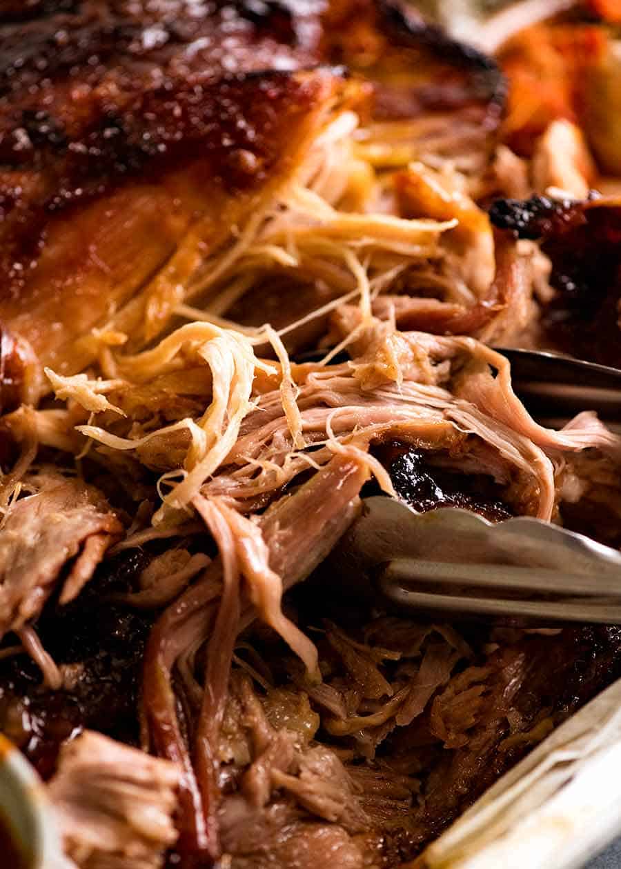 Close up showing tender pulled pork for Momofuku Bossam