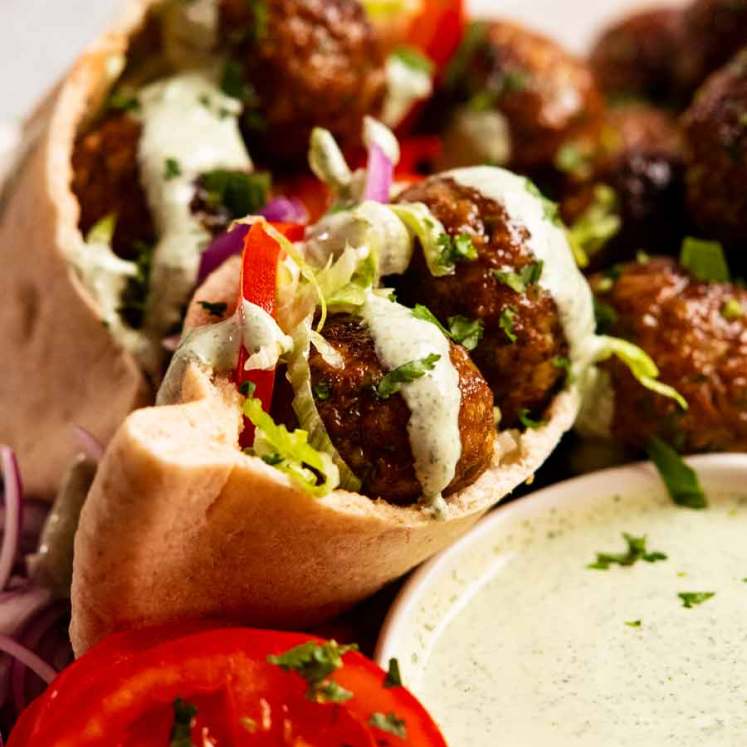 Close up of Moroccan lamb meatballs in pita pockets