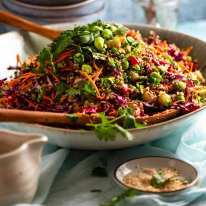 My Favourite Quinoa Salad in a large green bowl, ready to be served