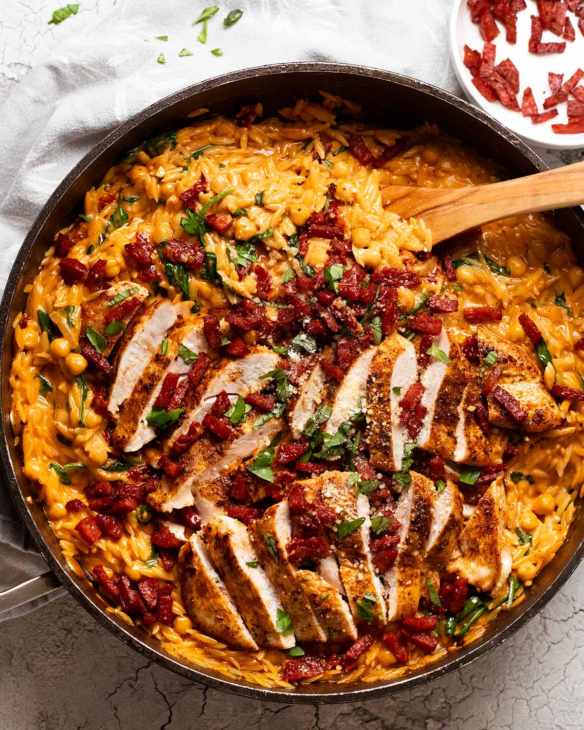 One pan chicken creamy tomato risoni with crispy salami (orzo)