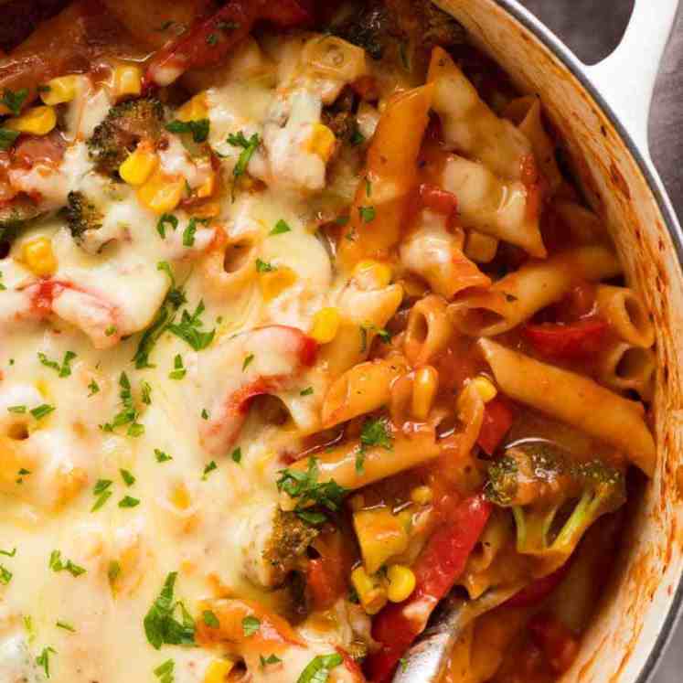 Overhead close up of One Pot Vegetable Pasta (healthy pasta recipe) in a white pot, fresh off the stove ready to be served