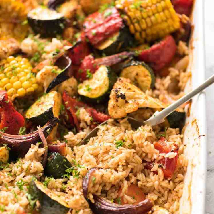 Oven Baked Rice and Vegetables - Fluffy seasoned rice and oven roasted vegetables, all made in ONE pan! Fabulous meal or side, super quick and easy to prep. recipetineats.com