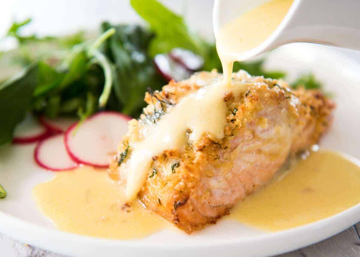 Baked Parmesan Crusted Salmon with Lemon Cream Sauce - easy and fast to make, can be prepared ahead, a stunning centrepiece for Christmas dinner and yet easy enough for midweek. That Lemon Cream sauce is the perfectly finishing tough. www.recipetineats.com