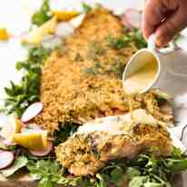 Baked Parmesan Crusted Salmon with Lemon Cream Sauce - easy and fast to make, can be prepared ahead, a stunning centrepiece for Christmas dinner and yet easy enough for midweek. That Lemon Cream sauce is the perfectly finishing tough. recipetineats.com