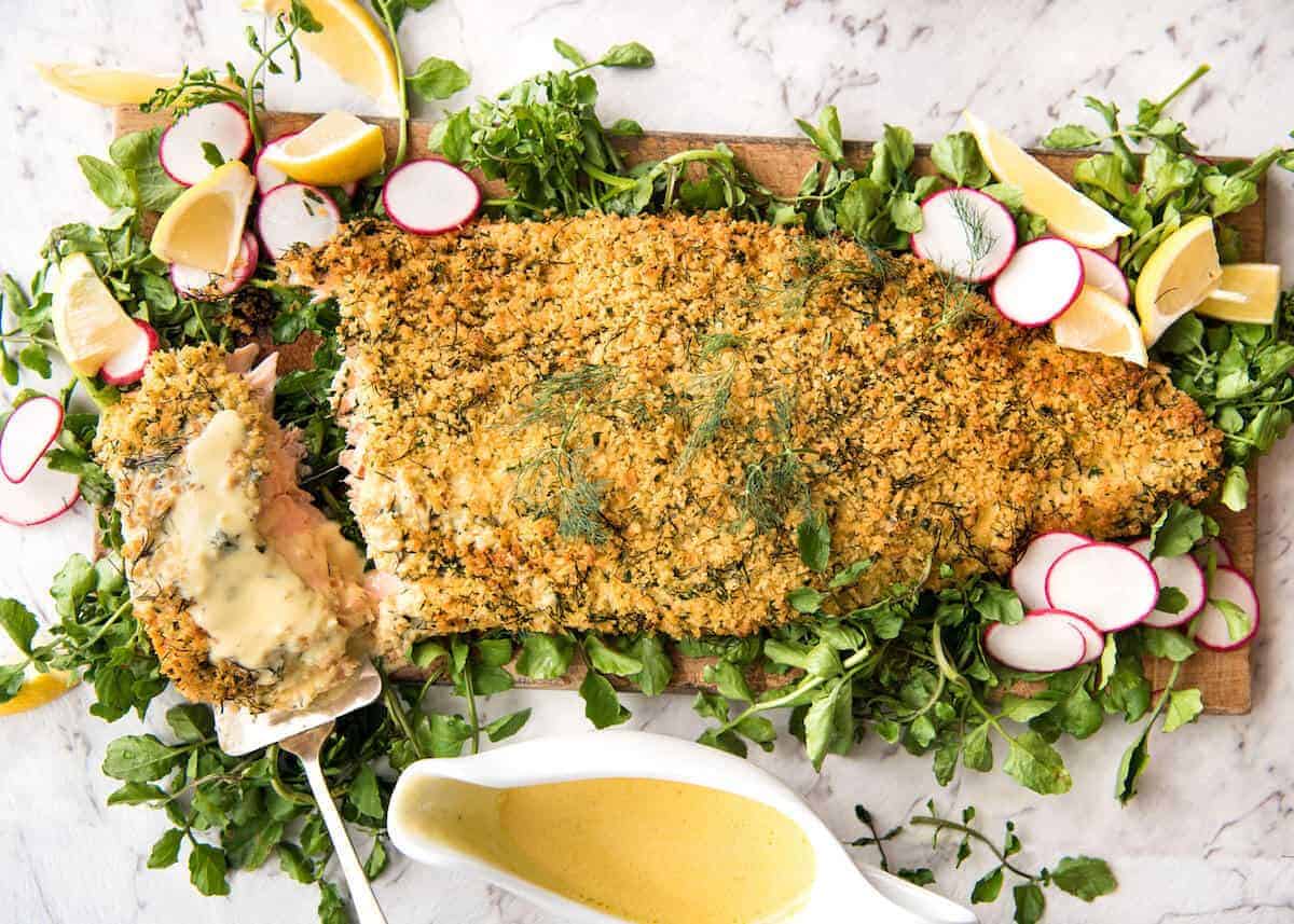 Baked Parmesan Crusted Salmon with Lemon Cream Sauce - easy and fast to make, can be prepared ahead, a stunning centrepiece for Christmas dinner and yet easy enough for midweek. That Lemon Cream sauce is the perfectly finishing tough. www.recipetineats.com