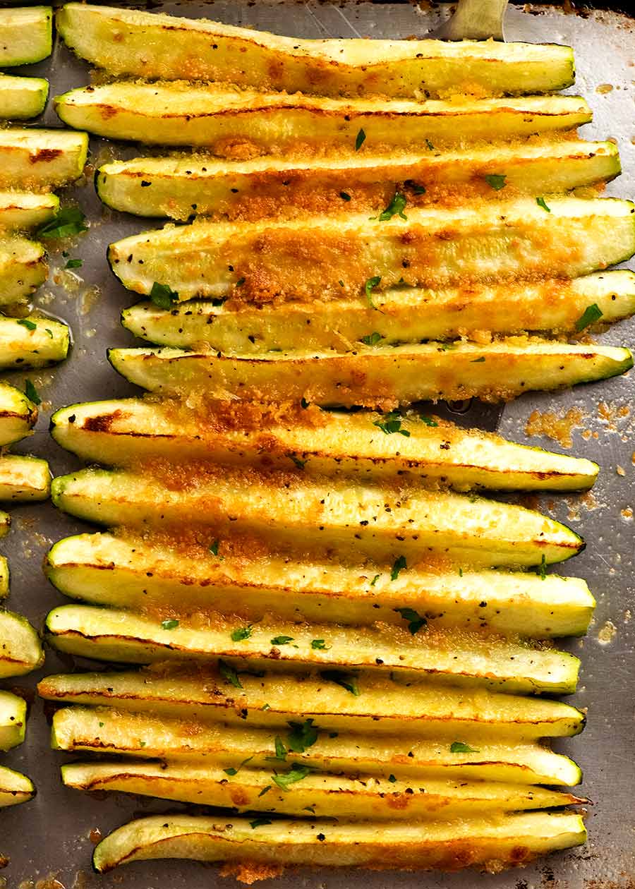 Quick baked zucchini on a tray, fresh out of the oven