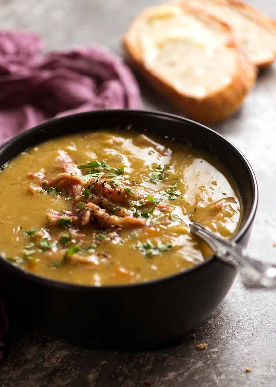 Pea and Ham Soup in a bowl with a side of toast, ready to be eaten