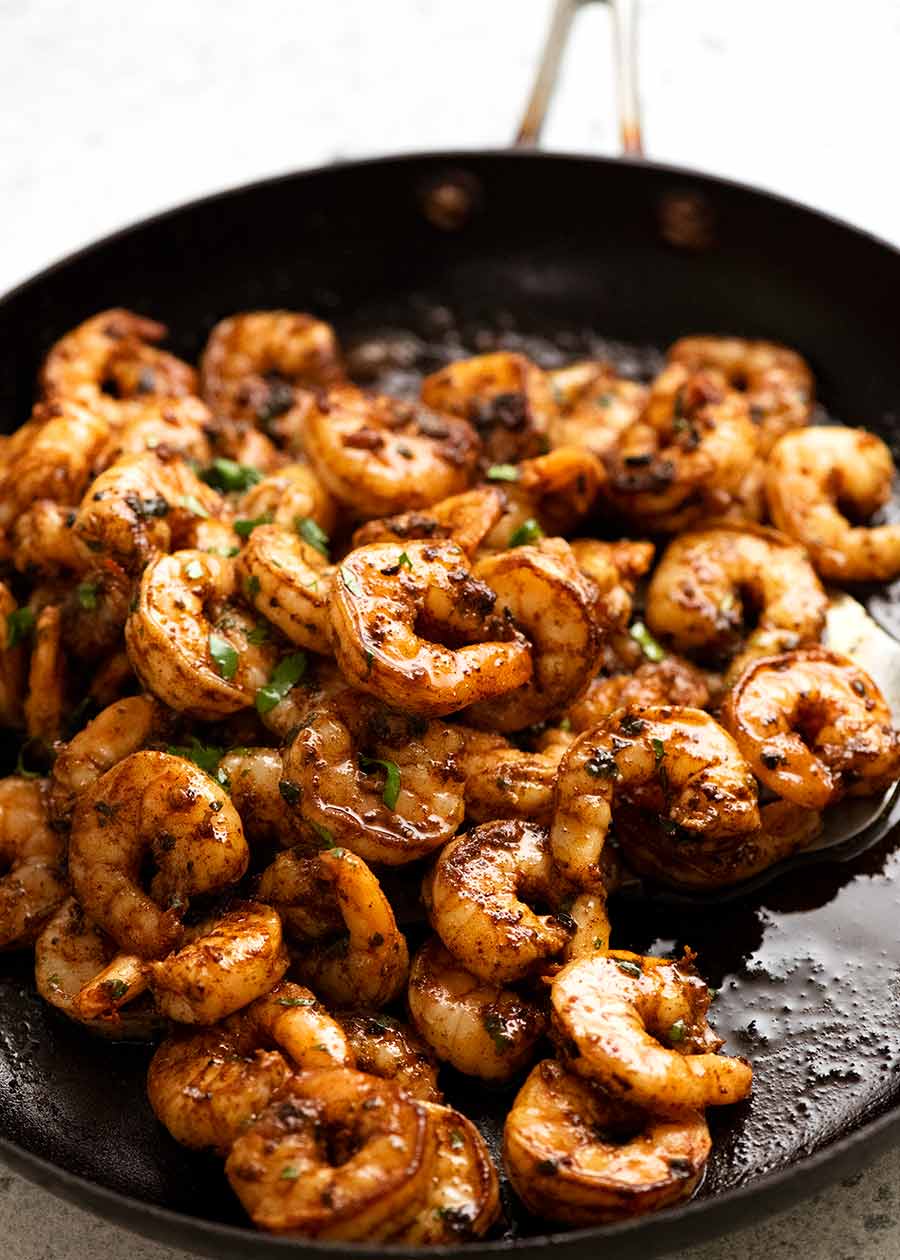 Skillet filled with freshly cooked prawns for tacos