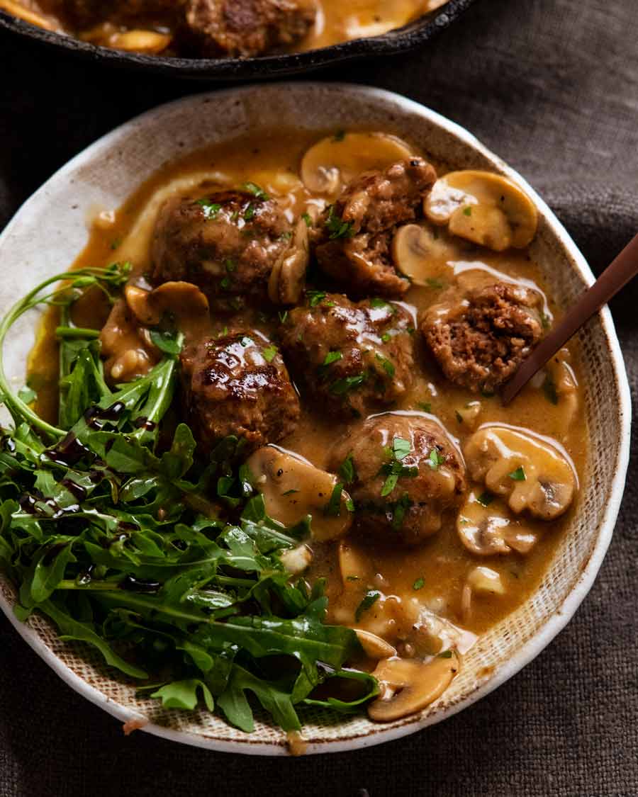 Salisbury steak meatballs served over mashed potato