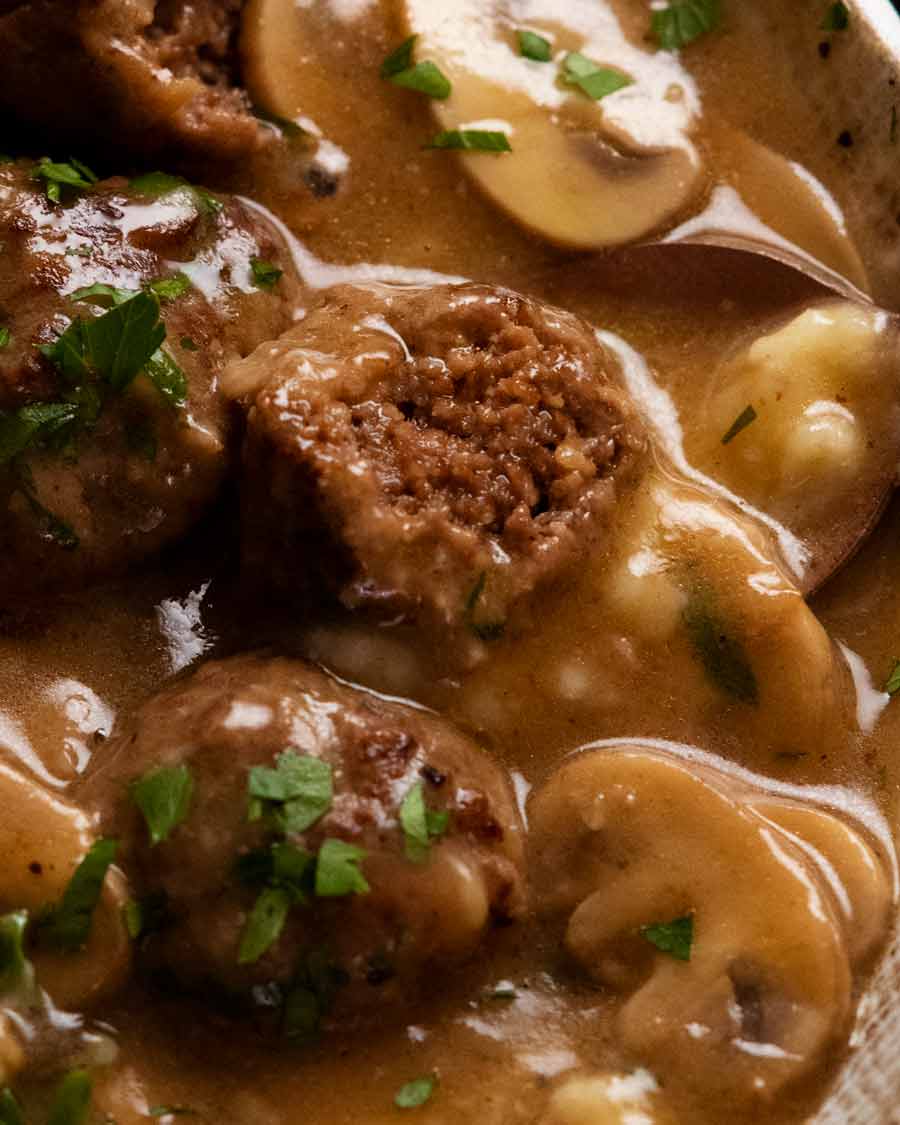 Cut open Salisbury steak meatballs to show how tender it is inside