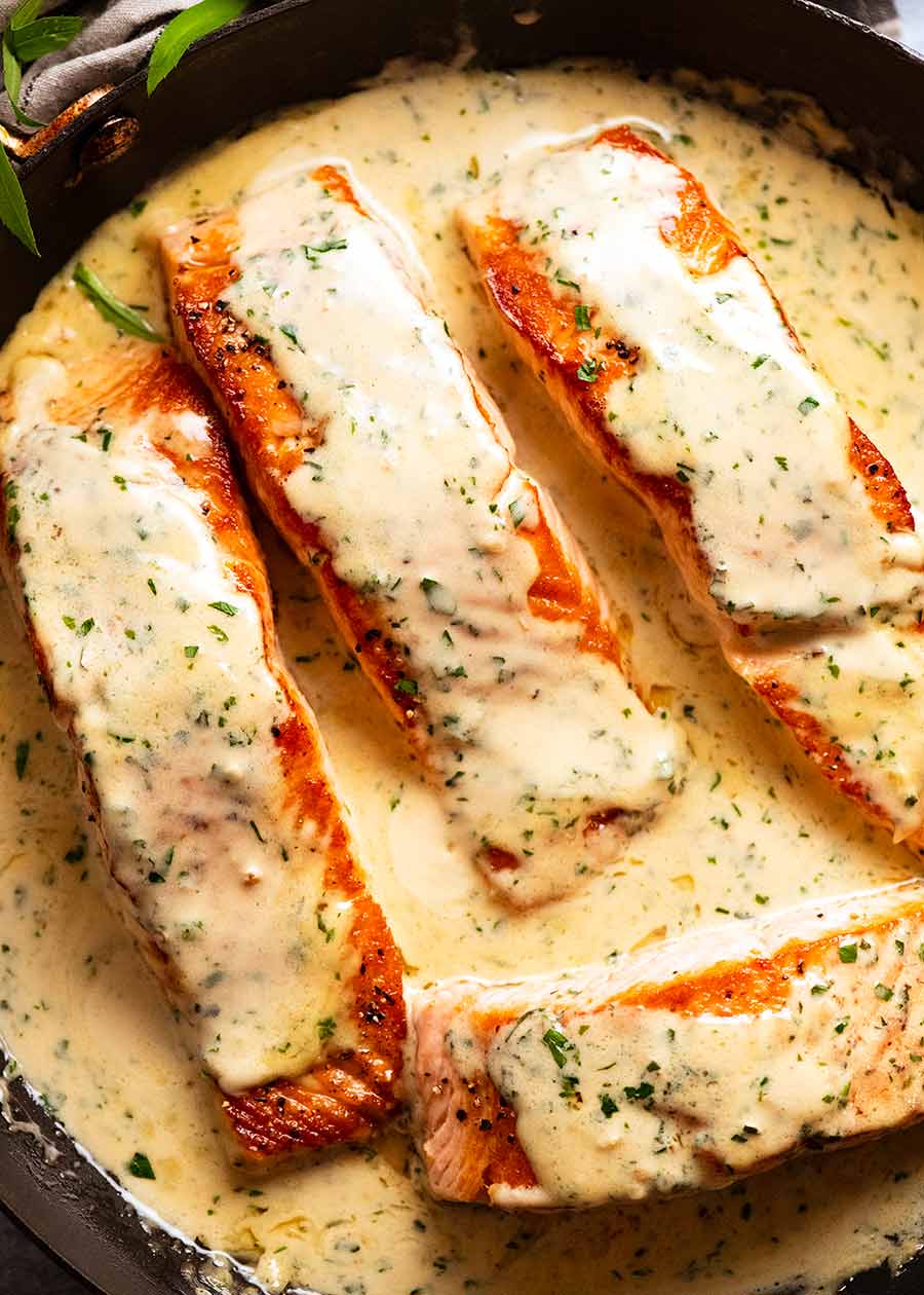 Creamy Herb & Garlic Salmon Sauce in a skillet, fresh off the stove, ready to be served