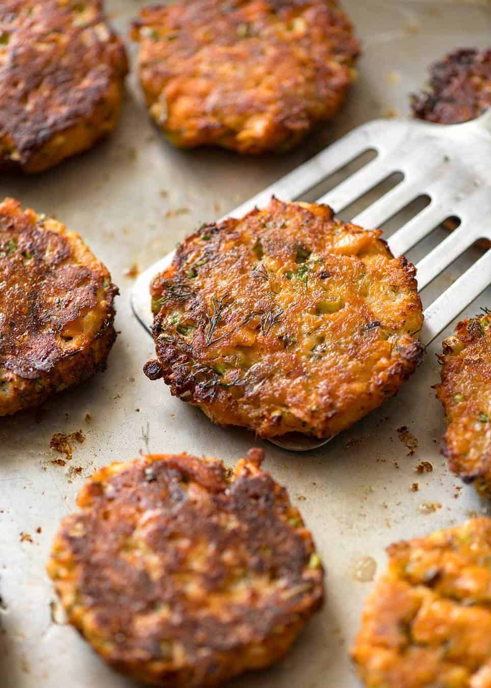 Tender insides studded with flakes of salmon, golden on the outside, these Salmon Patties are baked, not fried. Ultimate transformation of canned salmon - or use fresh! www.recipetineats.com