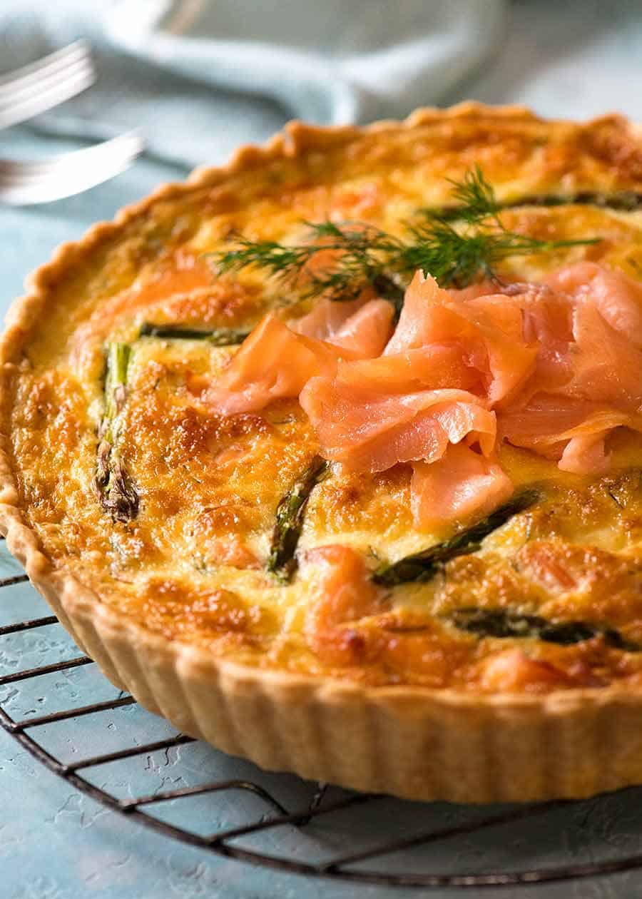 Homemade Salmon Quiche made with smoked salmon cooling on a rack, fresh out of the oven