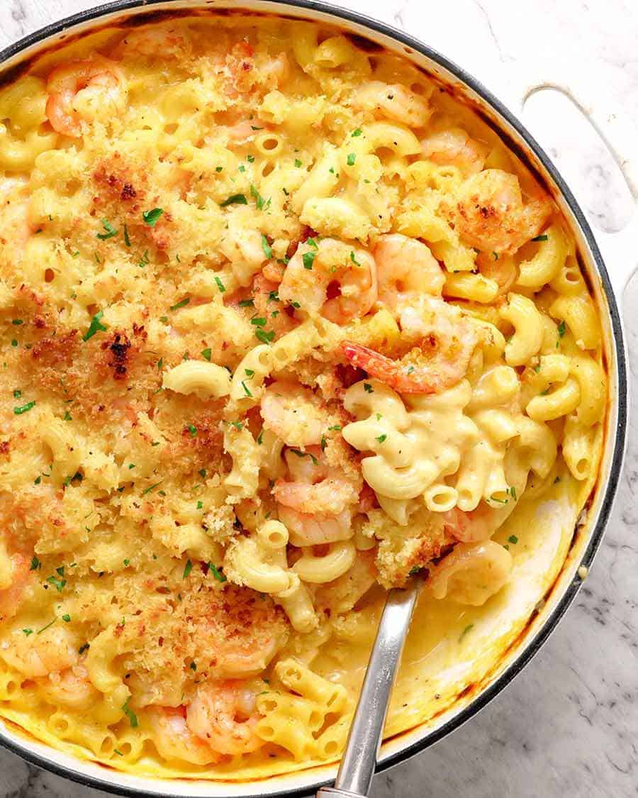 Over head photo of Garlic Shrimp Mac and Cheese, fresh out of the oven in a white skillet