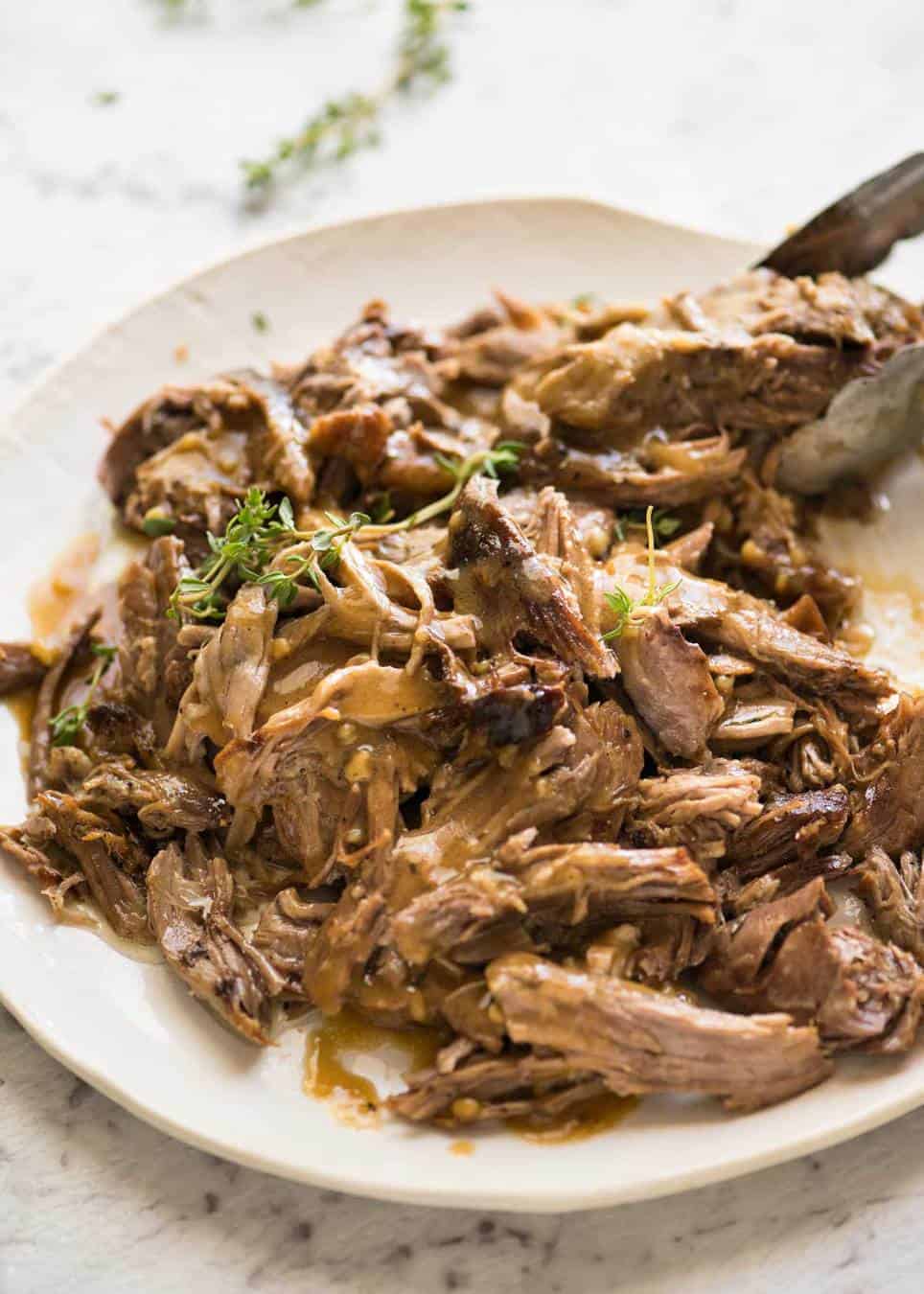 The most succulent and easiest lamb leg ever, this Slow Cooker Roast Lamb Leg takes minutes to prepare. The gravy is incredible! recipetineats.com